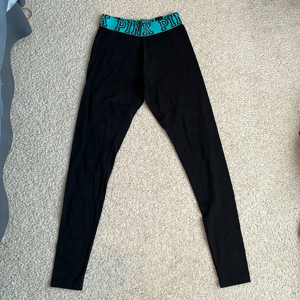 Black leggings, blue waist band